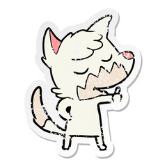 distressed sticker of a friendly cartoon fox giving thumbs up sign