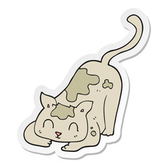 sticker of a cartoon cat playing