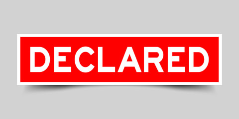 Label sticker in red color square shape as word declared on white background