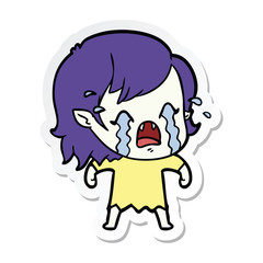 sticker of a cartoon crying vampire girl