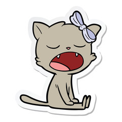 sticker of a cartoon yawning cat