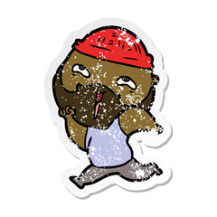 distressed sticker of a cartoon happy bearded man