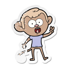 distressed sticker of a cartoon shocked monkey