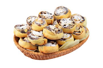 Homemade cookie roll with poppy in a wattled basket