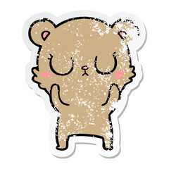 distressed sticker of a peaceful cartoon bear