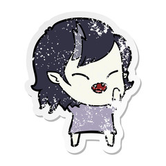distressed sticker of a cartoon laughing vampire girl