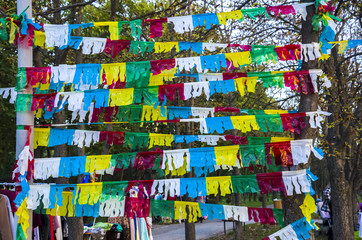 Festive decoration of colorful flags, ribbons