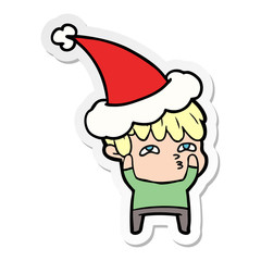 sticker cartoon of a curious man wearing santa hat