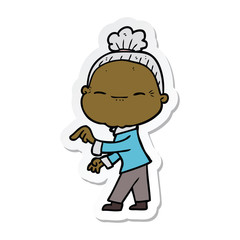 Fototapeta premium sticker of a cartoon peaceful old woman
