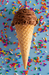 Scoop of Chocolate Ice Cream in a Waffle Cone