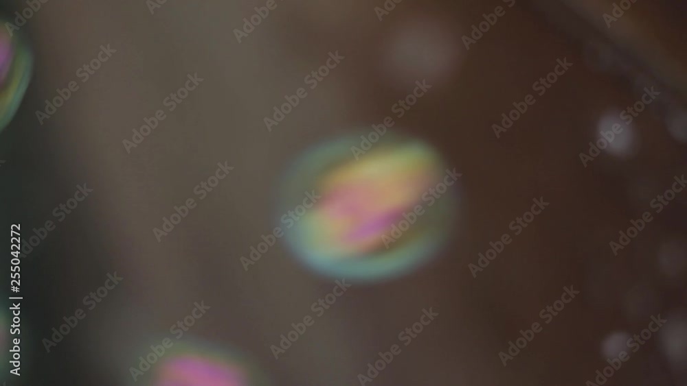 Aufkleber hundreds of soapy bubbles float passed quickly. close up with shallow depth of field.