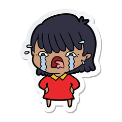 sticker of a cartoon girl crying