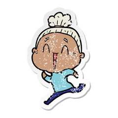 distressed sticker of a cartoon happy old lady