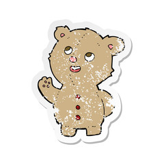 retro distressed sticker of a cartoon cute teddy bear