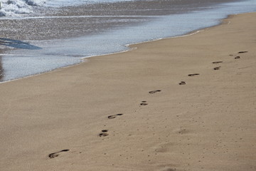 Huellas en la playa