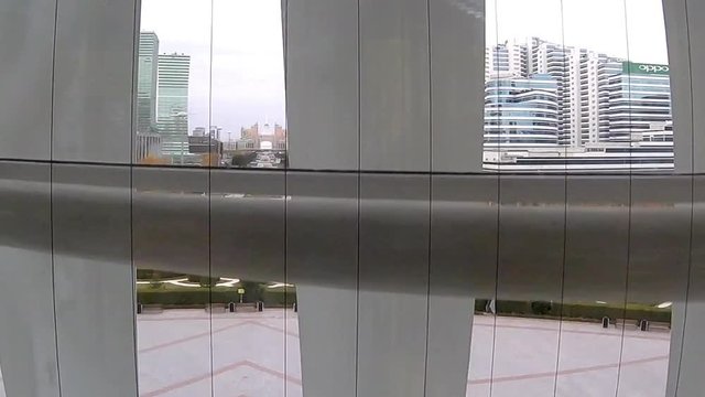 Going up to a structure In a the glass elevator