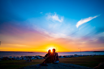 silhouette of woman at sunset