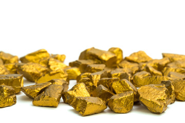 A pile of gold nuggets or gold ore on white background, precious stone or lump of golden stone, financial and business concept.
