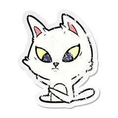 distressed sticker of a confused cartoon cat sitting
