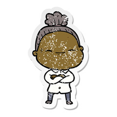 distressed sticker of a cartoon peaceful old woman