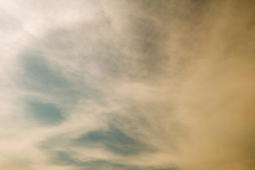 blue sky background with tiny clouds