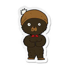 Obraz premium sticker of a cartoon little black bear