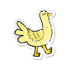 retro distressed sticker of a cartoon walking bird