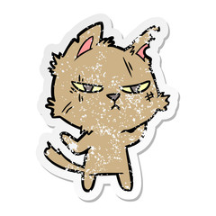 distressed sticker of a tough cartoon cat