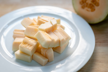 cantaloupe melon slices on plate
