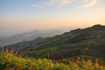 mountain view with curve road and sunset