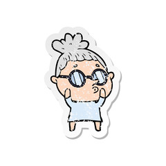 distressed sticker of a cartoon woman wearing glasses