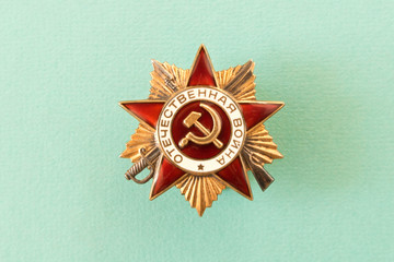 The order of the Great Patriotic war on the blue background . Filmed in Minsk, Belarus , may 9,2018.