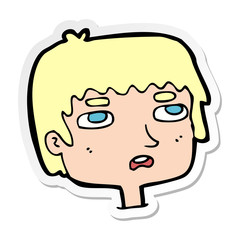 sticker of a cartoon unhappy face