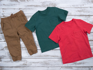 Clothes for men, kids, boys (cotton tees). Spring summer collection, classic look, fashion concept. Flat lay, view from above
