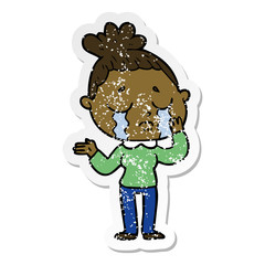 distressed sticker of a cartoon crying woman