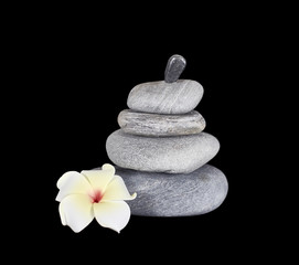 Stacked Rocks with a Plumeria Flower