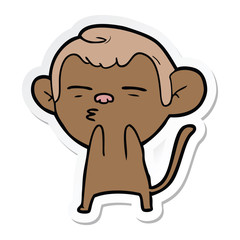 sticker of a cartoon suspicious monkey