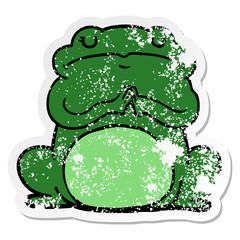 distressed sticker of a cartoon arrogant frog