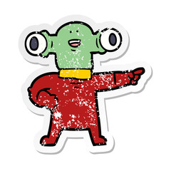 distressed sticker of a friendly cartoon alien pointing