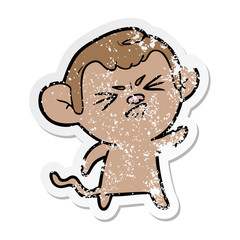distressed sticker of a cartoon angry monkey