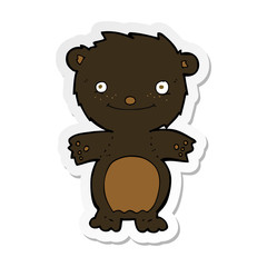 sticker of a cartoon happy little black bear