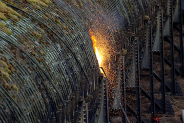 torch fire against pipeline background