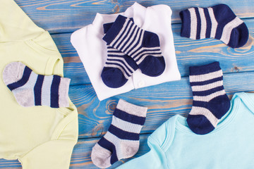 Apparel for newborn, extending family and expecting for baby concept