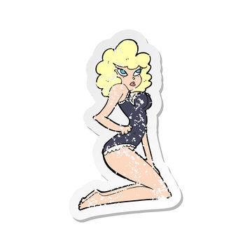 retro distressed sticker of a cartoon pin-up woman