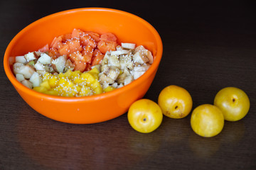 Orange dish with minced fruits