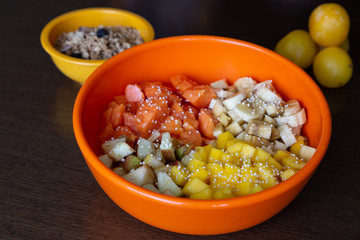 Orange dish with minced fruits
