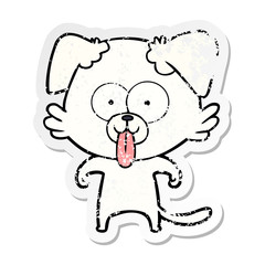 distressed sticker of a cartoon dog with tongue sticking out
