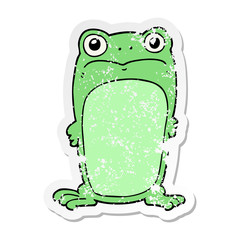 distressed sticker of a cartoon staring frog