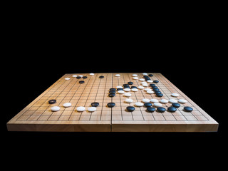 group of stones,Go game(Weiqi),Traditional asian strategy board game isolated on black background