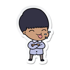 sticker of a cartoon boy sticking out tongue